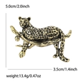 Golden and black enamel panther hugging a tree branch brooch with product dimensions - Gold