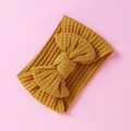 Macro detail of mustard yellow waffle knit baby headband with a decorative large bow - Mustard Yellow-Bow
