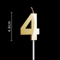 Detail of golden number 4 birthday candle with metallic finish and 4.8cm height mark - Gold Number 4