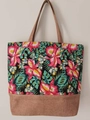 Linen tote bag with tropical flower prints and brown jute panel in a vertical view - Pattern 5