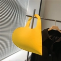 Unique bright yellow heart-shaped felt handbag for fashion styling and creative accessories - Yellow