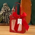 Premium dark red gift bag featuring a large bow, clear window, and Thank You tag - Burgundy + Thank You Tag