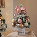 Mini white flocked Christmas tree with pink bows and gold ornaments on a tweed base - British Flocked Small Tree 30cm [With Light] - Pink