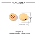 Macro view of 8mm gold stainless steel heart bead with red enamel for DIY jewelry - Gold Red Heart Bead