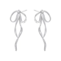 Detailed view of silver bow-shaped ribbon earrings with a polished metallic finish - Streamlined Ribbon Bow / VE1298 White Gold