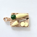 Miniature white radish food magnets set with cutting board and knife on white background - Radish Cutting Board