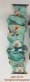 Light green scrunchie watch band with festive snowman and reindeer patterns - 38/40mm S Size Black Plastic Connector / Light Green Snowman
