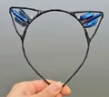 Macro detail of handmade cat ear headband featuring blue crystal clusters and wire wrapping - No.10 Blue Crystal