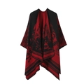 Close-up of knit shawl with red and black jacquard patterns and striped trim details - One Size / Jungle Pattern - Black Red