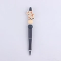 Detail of creative DIY cartoon cow silicone bead pen with black matte barrel and silver nib - Goat Beige