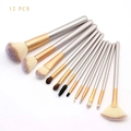 Detail view of 12-piece silver and gold makeup brush set with dual-tone bristles - 12 Pcs Off-White Brushes Only