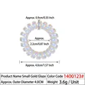 Schwarzes Spirale Telefonkabel Haargummi mit irisierendem Finish und 4 cm Durchmesser - Klein Gold Glanz