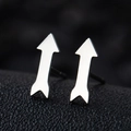 Macro side view of silver arrow earrings with polished stainless steel finish on black texture - Arrow / Silver
