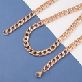 Detailed macro view of rose gold Cuban link necklace with secure lobster clasp closure - 60CM / Rose Gold