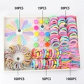 Kids hair accessory set in pastel colors featuring 1200+ clips, claws and elastic ties - C131 (1245PCS Boxed Set)