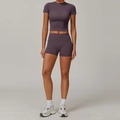 Women's two-piece yoga set with crop top and high-waisted shorts in deep purple color - S / Top And Bottom / Short Sleeve + Shorts / Eggplant Purple