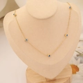 Collier doré avec perles d'oeil bleu sur un présentoir de cou de couleur chair - 4# Collier-Chaîne Croisée avec Perles Yeux