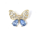 Squisita spilla a farfalla traforata con cristalli blu a goccia e cornice dorata - Oro