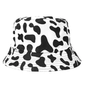 Reversible bucket hat with stylish black and white cow print pattern in neutral design - One Size / Black