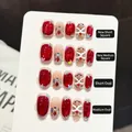 Handmade red cat-eye press-on nails with 3D butterflies and crystals in four shapes - XS / New Short Square