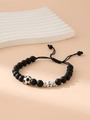 Adjustable matte black bead bracelet featuring a silver football charm and letter Z bead - Letter Z