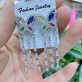 Handheld silver butterfly earrings with long fringe and multi-colored cubic zirconia crystals - Silver