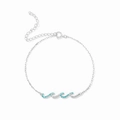Macro detail of silver wave bracelet featuring a blue gemstone and adjustable chain - 15.5+4.5cm / Platinum (Blue Zirconia)