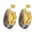Detail view of gold stainless steel hoop earrings with marbled resin inlay. - Black