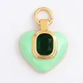 Mint green heart pendant with dark green gemstone and golden metal hook detail - L267027-Light Green Green Square Zirconia Heart