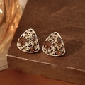 Macro shot of silver hollow triangle earrings with inlaid champagne crystals - Gold-Coffee (Silver Pin)