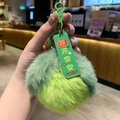 Green plush avocado keychain with peaceful blessing tag and cute rabbit patterns - Apple Peace And Safety