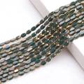 DIY jewelry making beads in 4x6mm oval dark green glass with gold edge finish - 4x6mm Gold Edged Seed Beads approx. 48pcs/Strand / Porcelain Green Gold Edge