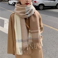 Thick winter scarf with color-block stripes and tassels worn with a camel coat - Camel Cream Striped / Khaki