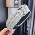 Detail of mint green knotted headband with pearls, sequins and woven beads for women - Light Blue