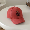 Detailed view of red cotton baseball cap featuring bear embroidery and white stitching - 50-52cm (2-5 Years) / Orange Red