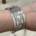 Vintage style wide silver cuff bracelet with intricate floral engravings and open design - Silver Vintage Carved Textured Bracelet (D1489)