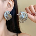Macro view of silver twisted irregular earrings with liquid metal lava texture for women - 27# Silver Earring Post - Silver - Liquid Melted Round