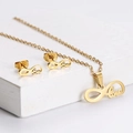Gold-tone infinity love necklace and earrings set on minimalist textured display stand - Infinity LOVE