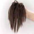Messy bun hair piece in natural brown color with a claw clip for volume - Tan