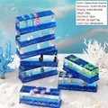 Creative acrylic liquid drift bottle with floating blue dolphins and marine animals - Marine Series Cartoon Liquid Ornament