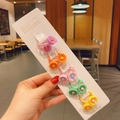Five colorful floral girls hair ties in purple, orange, pink, green and yellow on card - 3D Daisy Style (25#) / 10 Pieces Pack