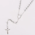 Detailed close-up of a silver rosary necklace with a crucifix and oval holy medal - Style 2 (Smooth Border Medal) / Silver