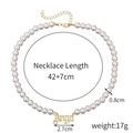 Baroque multilayer pearl necklace with golden Angel pendant and 42+7cm adjustable chain - Gold Angel Pearl Necklace