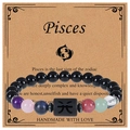 Pisces zodiac bracelet featuring colorful natural crystal beads and a black symbol bead - Pisces