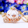 Golden pumpkin carriage keychain with white enamel and sparkling rhinestones - White Single-Sided