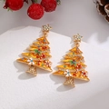 Close-up of gold Christmas tree earrings with orange rhinestones and star pendants - 25 KC Gold 8958