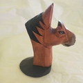 Hand-carved wooden horse glasses holder with reddish-brown finish and black base stand - Brown Horse