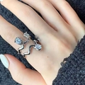 Irregular wavy silver open ring featuring three sparkling round zircon stones on hands - Wavy Zircon Opening Ring (J0334)