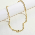 Close-up of 14K gold plated toggle clasp necklace with intricate engraved texture links - OT Buckle Necklace