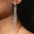 Elegant silver tassel drop earrings with sparkling rhinestones worn by a model - Silver Multi-Layer Long Tassel Luxurious Drop Earrings (DTE1816119S)